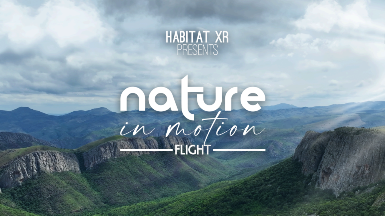 Mountain landscape under cloudy sky with text overlay reading 'HABITAT XR presents nature in motion FLIGHT'.